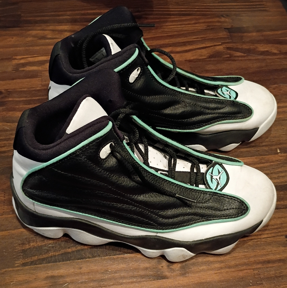 Black and White Athletic Sneakers with Teal Accents